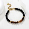 Armkettchen für Damen mit Tigerauge und schwarzen Perlen – 18K PVD vergoldeter Edelstahl