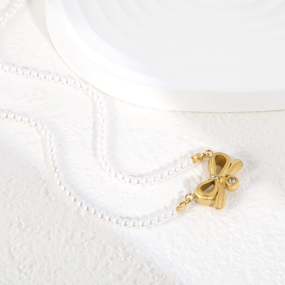 Perlenkette Damen mit Schleifen-Anhänger und Zirkonia – 18K PVD vergoldeter Edelstahl