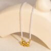 Perlenkette Damen mit Schleifen-Anhänger und Zirkonia – 18K PVD vergoldeter Edelstahl