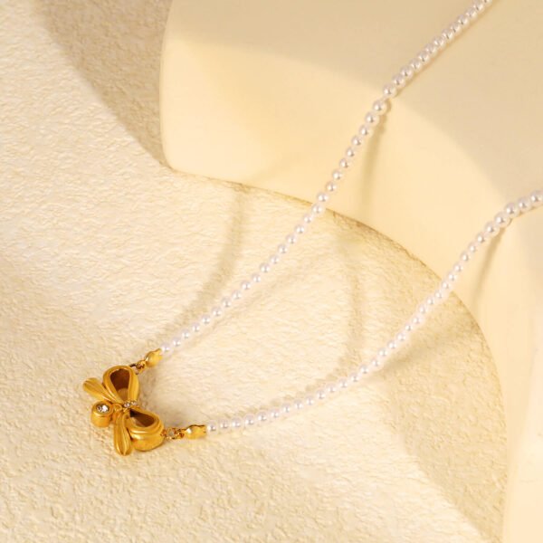 Perlenkette Damen mit Schleifen-Anhänger und Zirkonia – 18K PVD vergoldeter Edelstahl